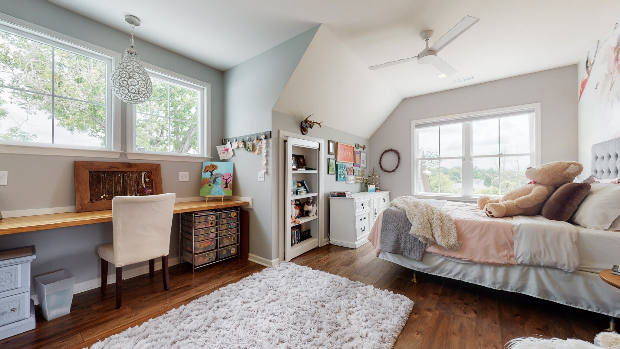 5530 Baker Road Murfreesboro, TN 37129 - Photo 24 of 49 Sure to please the dueling siblings (or guests) are two bedrooms upstairs - exact duplicates of each other - blessed with large windows, built-in desk tops, hard wood floors, and 9' ceilings.