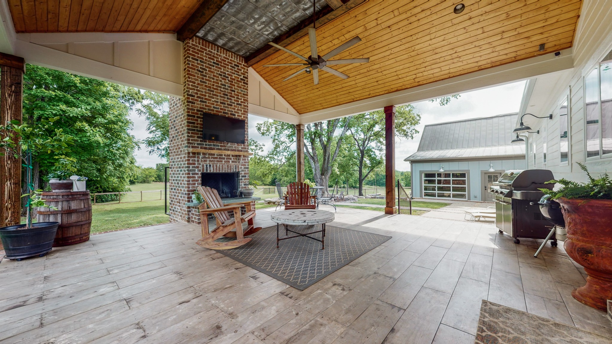 5530 Baker Road Murfreesboro, TN 37129 - Photo 31 of 49 Notice the metal strip in the ceiling? That is from the metal roof of the previous homestead! It again adds to that farmhouse feeling and charm. Enjoy a crisp, fall evening w/friends around this wood-burning fireplace with gas starter.