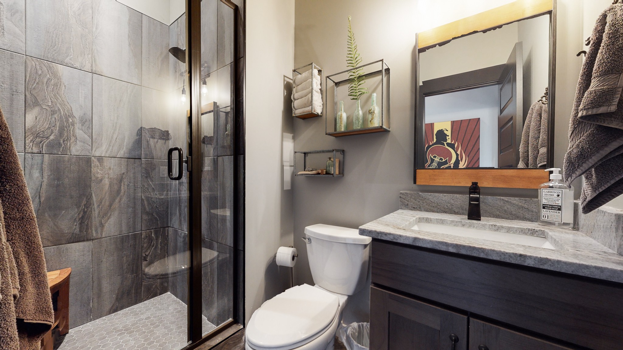 5530 Baker Road Murfreesboro, TN 37129 - Photo 39 of 49 The bathroom is on the main level and is finished with this striking tile shower and granite sink.