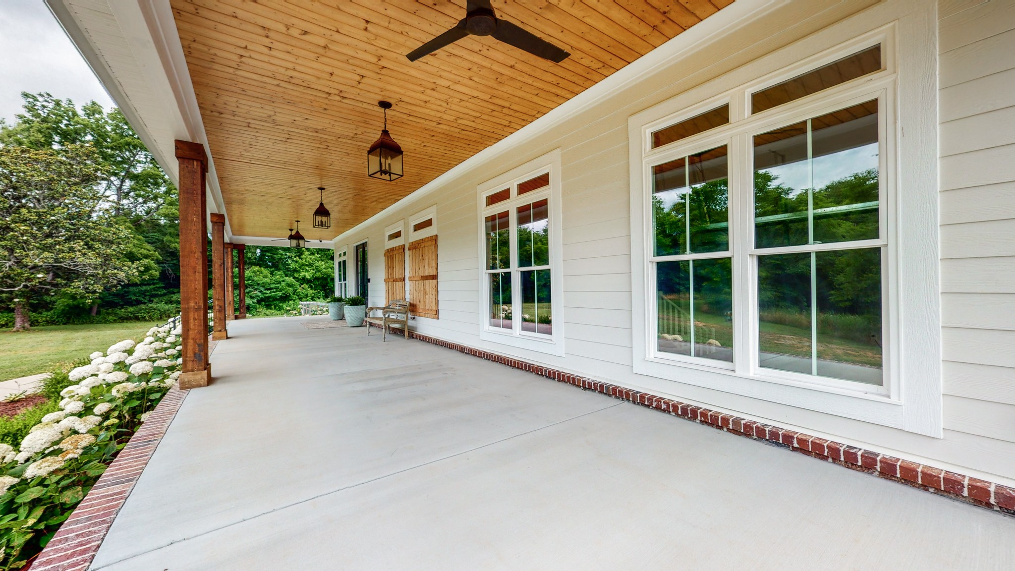 5530 Baker Road Murfreesboro, TN 37129 - Photo 5 of 49 This front porch is nicely crowned by the V Groove wood ceiling. With the ceiling fans & abundant accent lighting, you can enjoy this area in the spring, summer, fall, & during the day or night! Grab some sweet tea, a rocking chair and sit a spell.