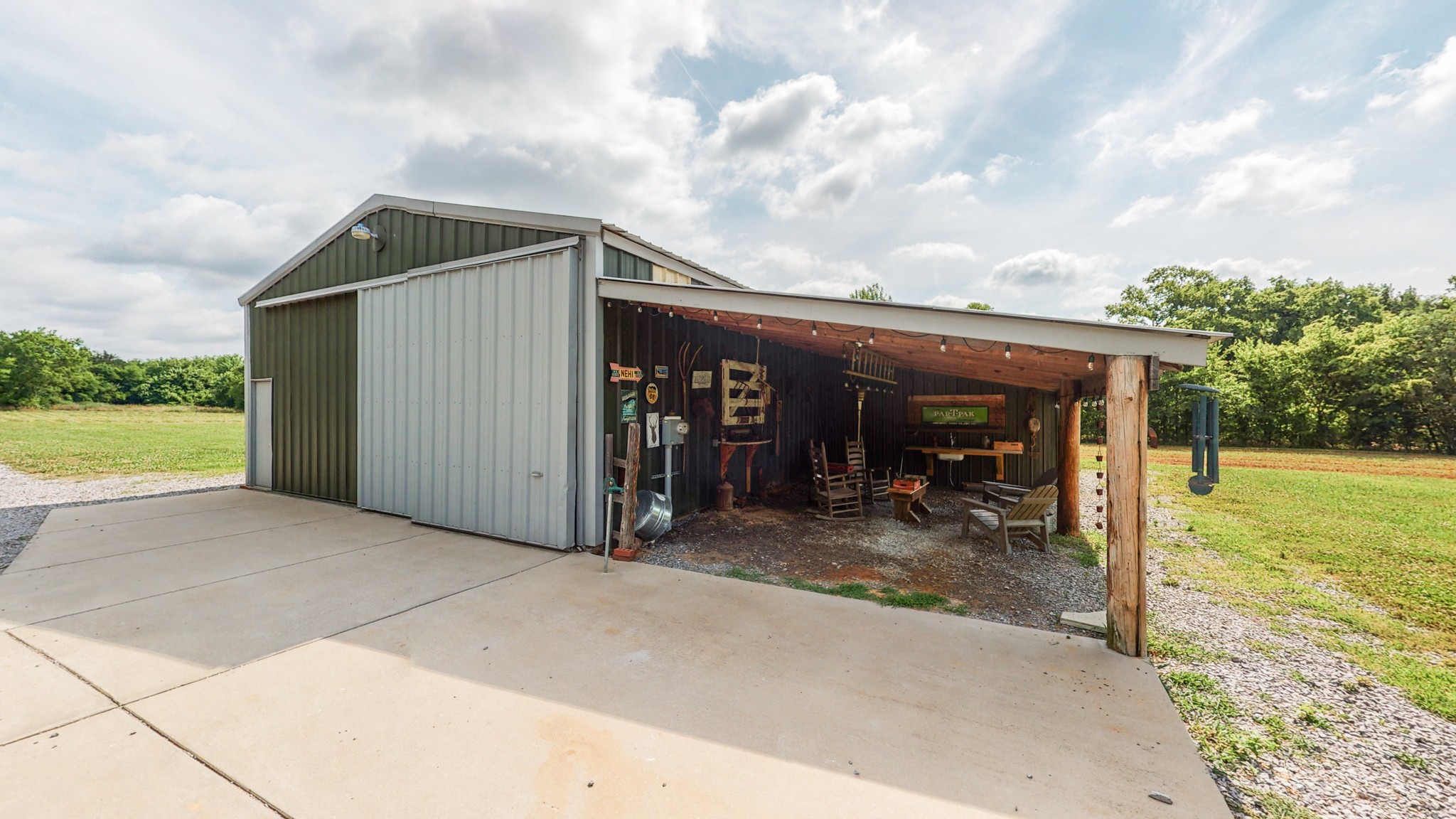 5530 Baker Road Murfreesboro, TN 37129 - Photo 42 of 49 Sitting along the driveway into the property is this workshop and concrete pad. It has electricity and can be locked.