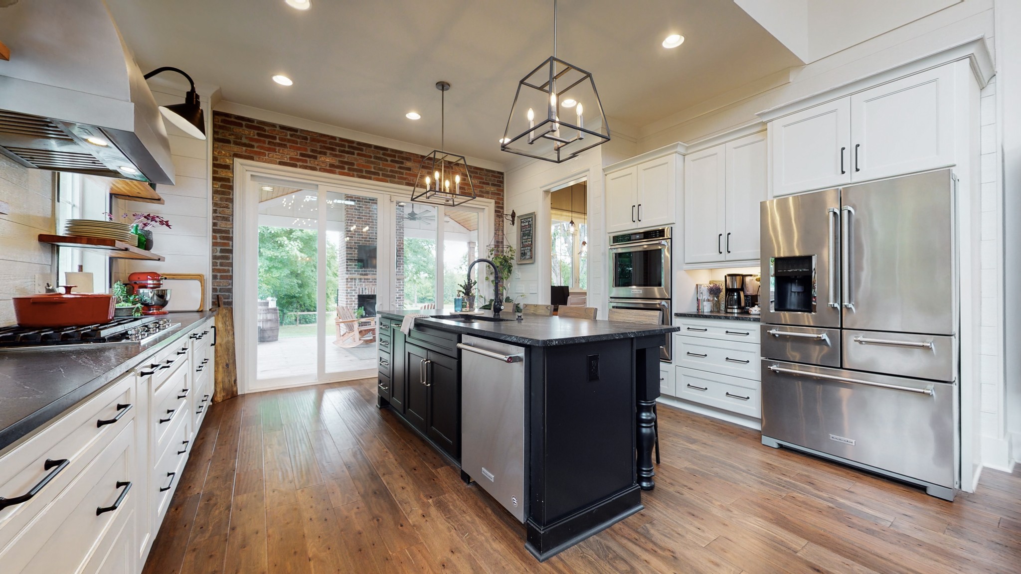 5530 Baker Road Murfreesboro, TN 37129 - Photo 10 of 49 The carefully chosen finishes in the home give it a very welcoming & comfortable feel. Hard wood floors are throughout the main level AND upstairs! Enjoy cooking with a gas cooktop & stainless steel double ovens.