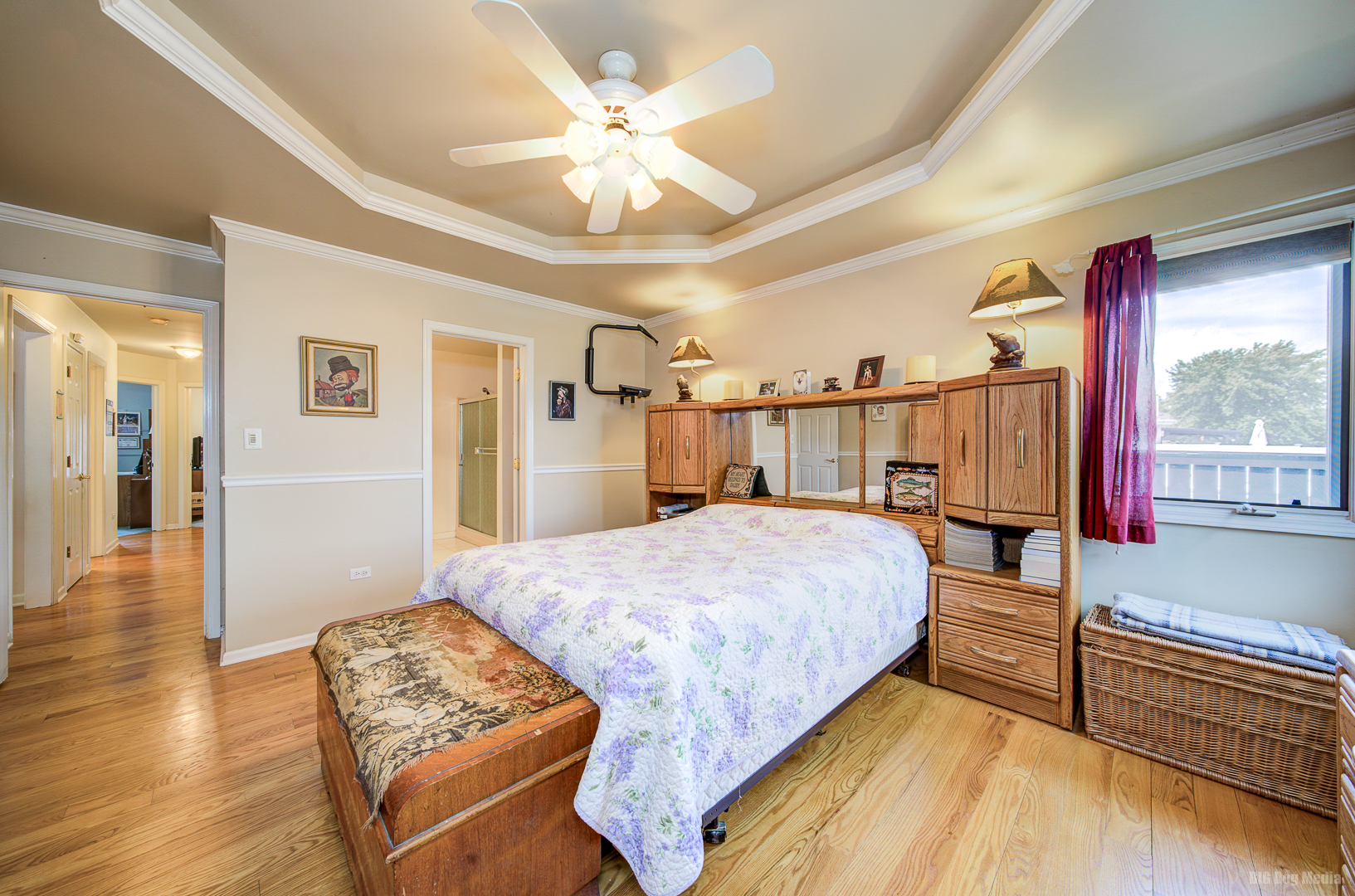 26253 South Ruby Street Monee, IL 60449 - Photo 17 of 45 a bed room with a bed and a chandelier