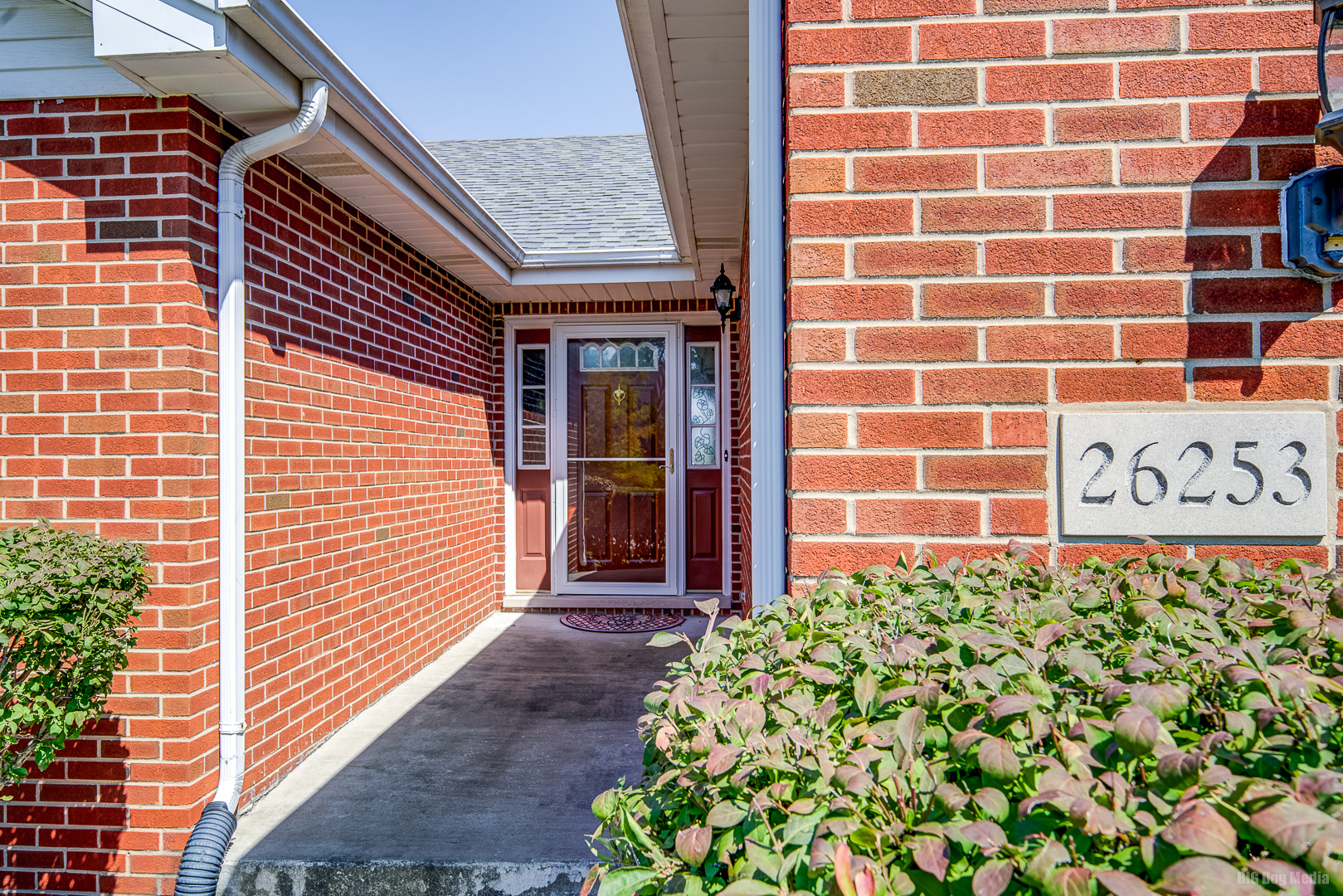 26253 South Ruby Street Monee, IL 60449 - Photo 2 of 45 a view of a building with potted plants