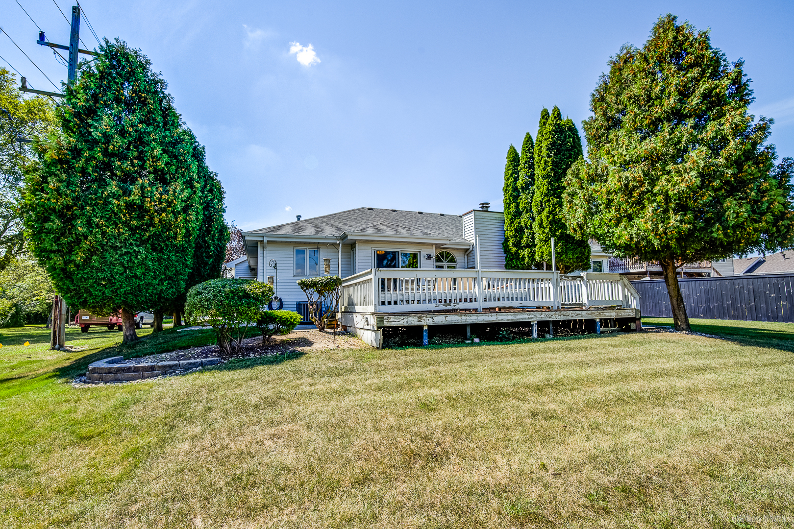 26253 South Ruby Street Monee, IL 60449 - Photo 38 of 45 a view of a house with a yard table and chairs