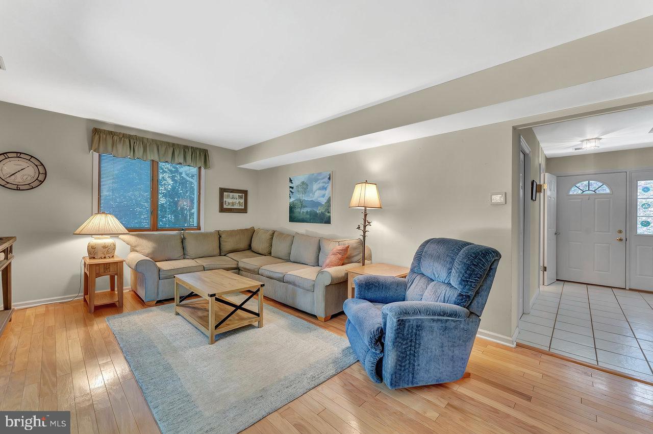 79 Wolfpack Road Hamilton, NJ 08619 - Photo 12 of 30 a living room with furniture rug and window