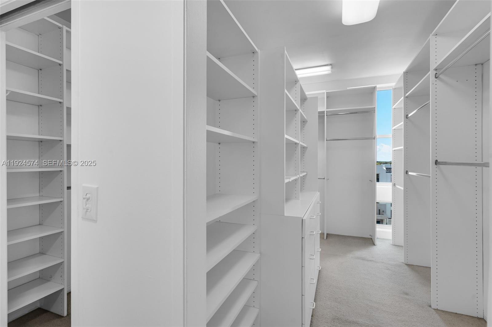 700 Biltmore Way, Unit 710 Coral Gables, FL 33134 - Photo 21 of 41 a view of walk in closet with empty racks