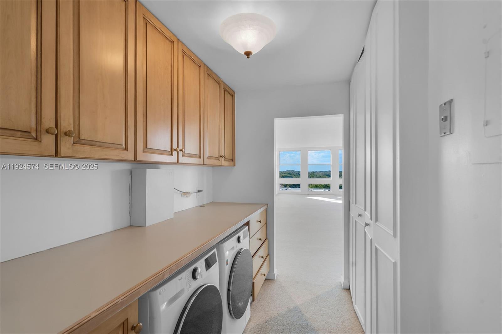 700 Biltmore Way, Unit 710 Coral Gables, FL 33134 - Photo 30 of 41 a view of a kitchen with electric appliances