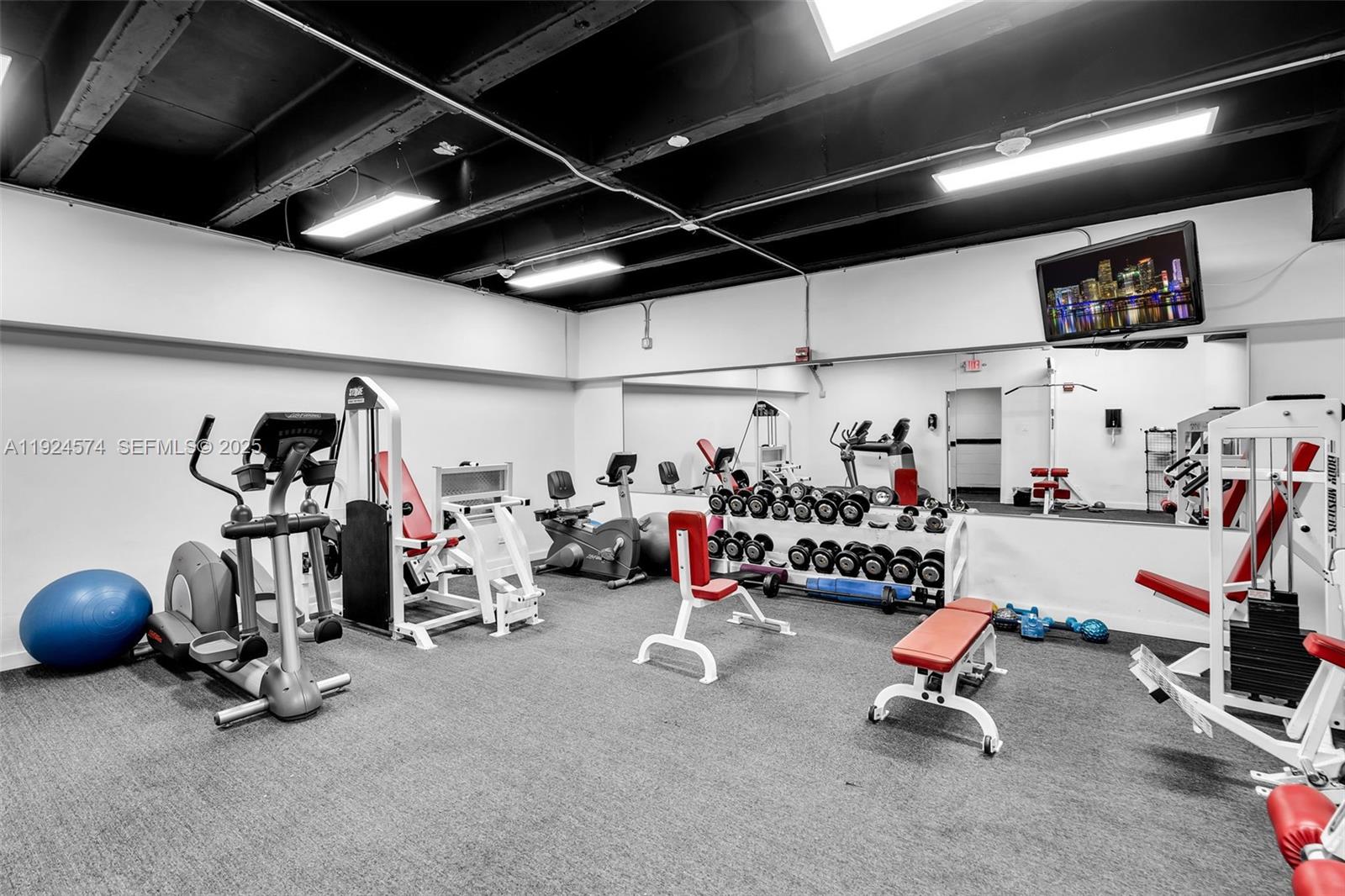 700 Biltmore Way, Unit 710 Coral Gables, FL 33134 - Photo 35 of 41 a view of a room with gym equipment