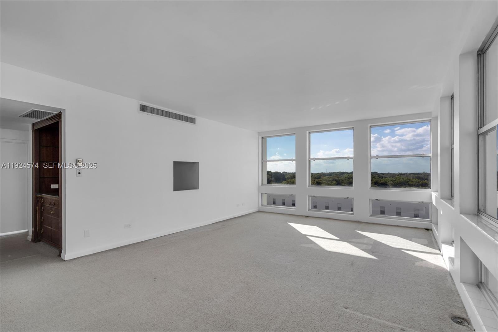 700 Biltmore Way, Unit 710 Coral Gables, FL 33134 - Photo 8 of 41 a view of an empty room with a window