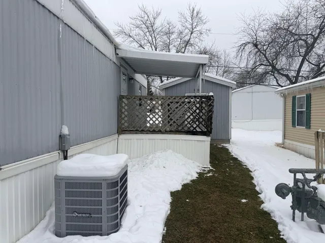 a view of a backyard of the house