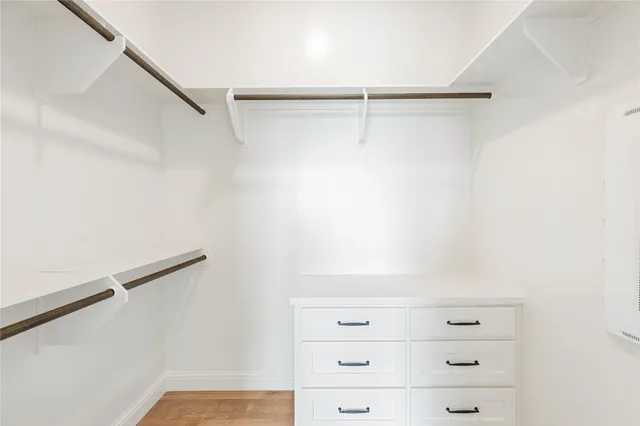 a view of an empty walk in closet