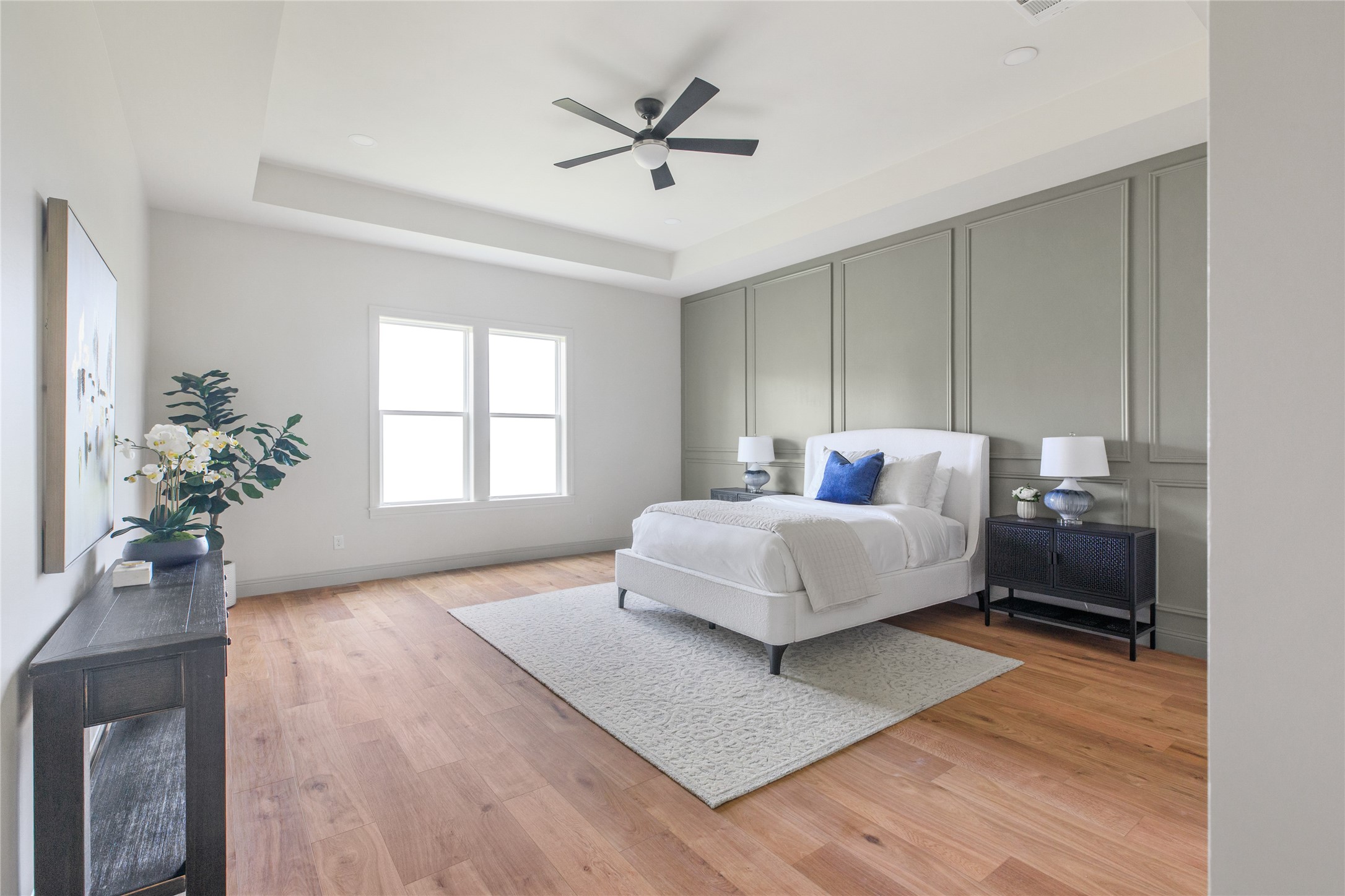 1355 Bluebonnet Ridge Drive Chappell Hill, TX 77426 - Photo 17 of 37 a bedroom with a large bed potted plant and a window