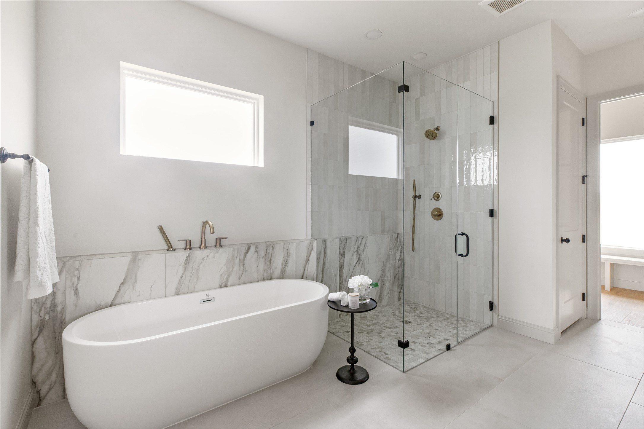 1355 Bluebonnet Ridge Drive Chappell Hill, TX 77426 - Photo 20 of 37 a white bath tub sitting next to a bathroom sink