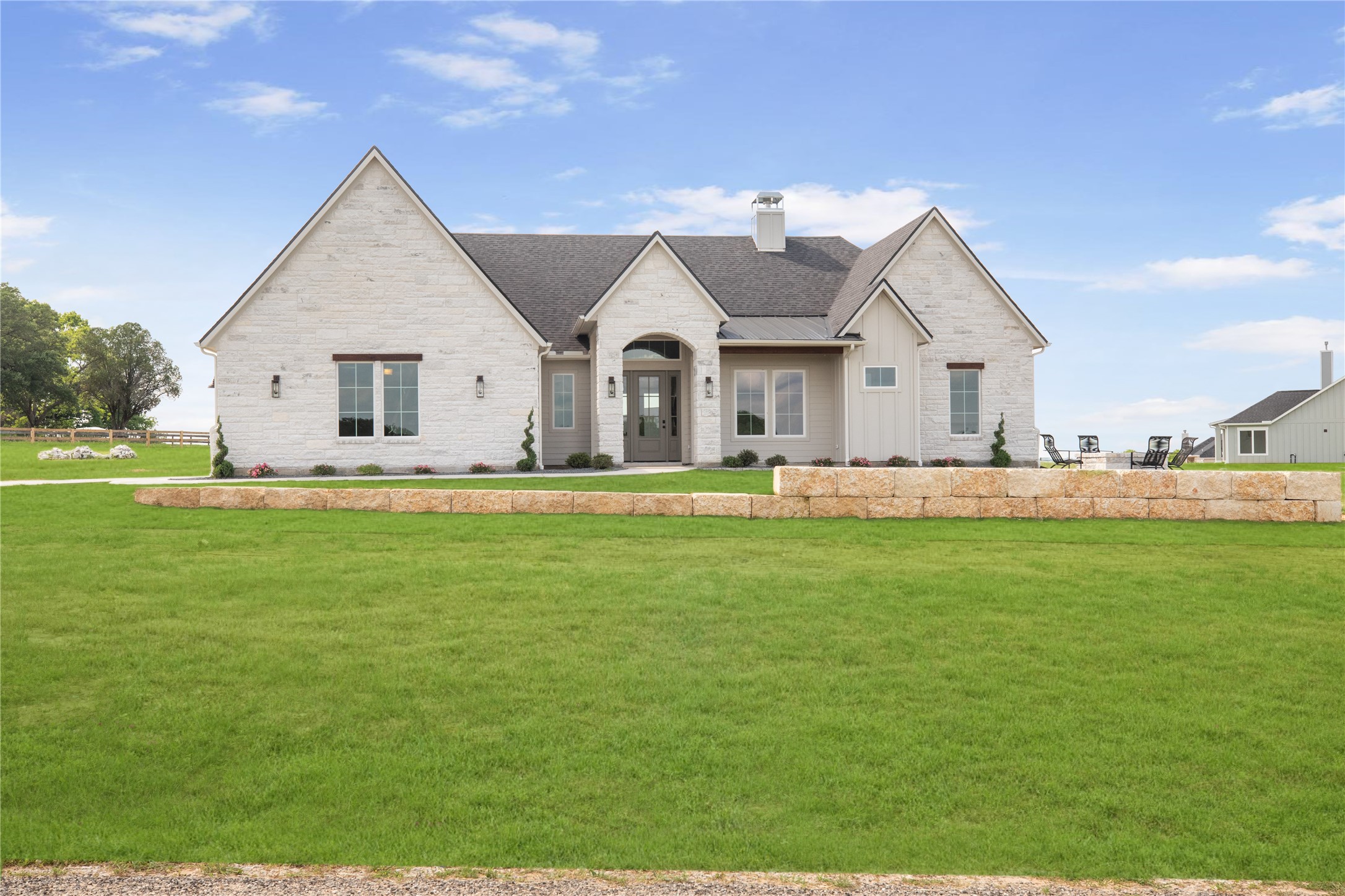 1355 Bluebonnet Ridge Drive Chappell Hill, TX 77426 - Photo 2 of 37 a front view of house with yard and green space