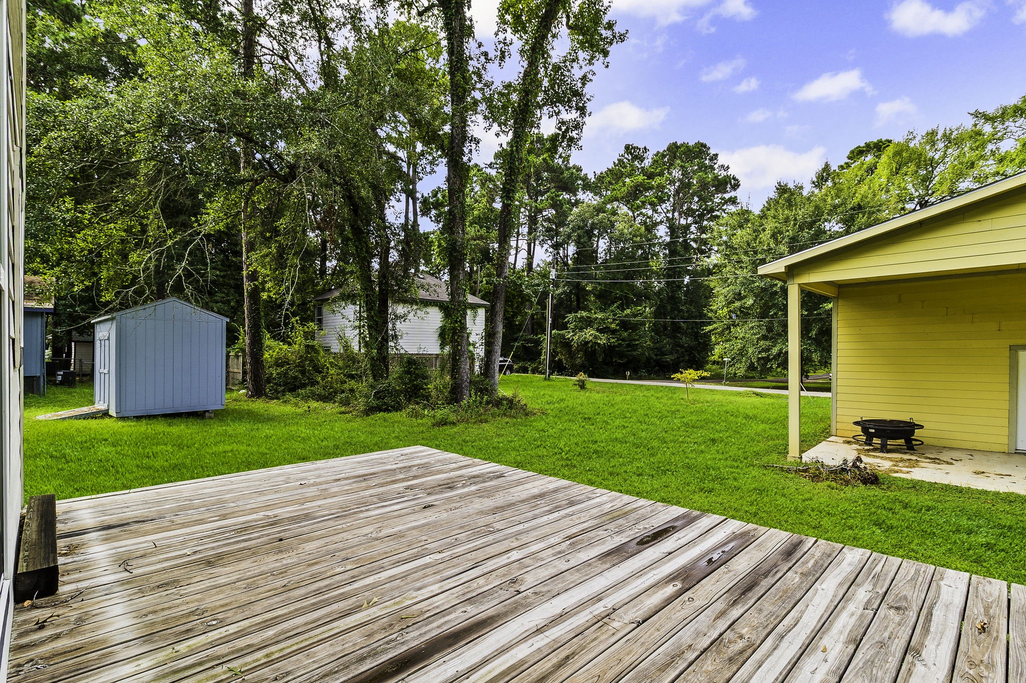 155 Cherry Tree Livingston, TX 77351 - Photo 14 of 30 a view of a backyard with sitting area