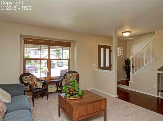 7831 Swiftrun Road Colorado Springs, CO 80920 - Photo 10 of 35 the living room and view out of the front picture window