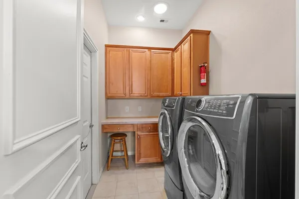 a view of livingroom with washer and dryer