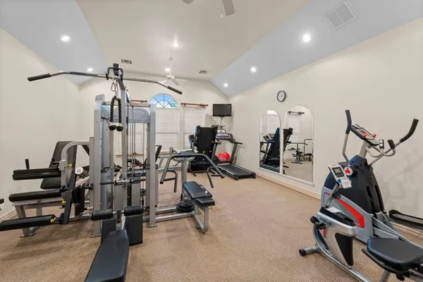 a view of a room with gym equipment