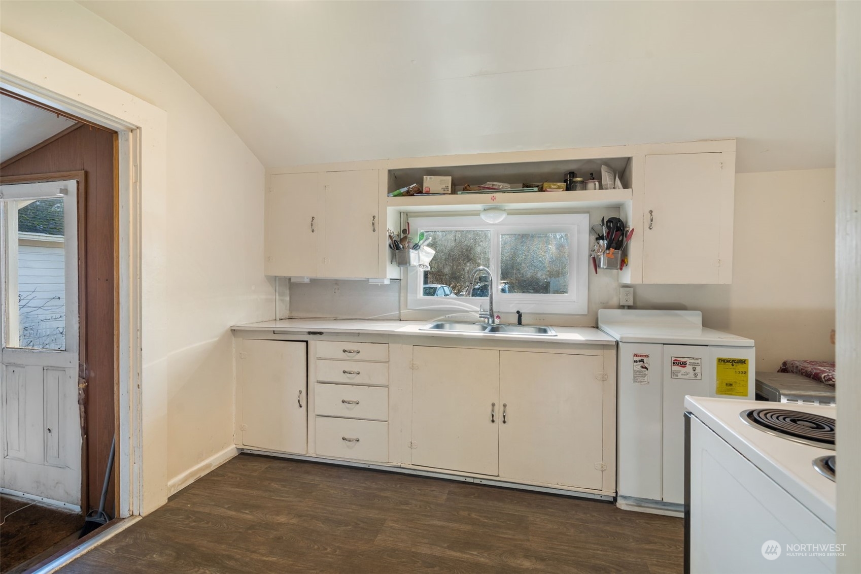 3155 Mountain View Road Ferndale, WA 98248 - Photo 11 of 31 a kitchen with cabinets a sink and appliances