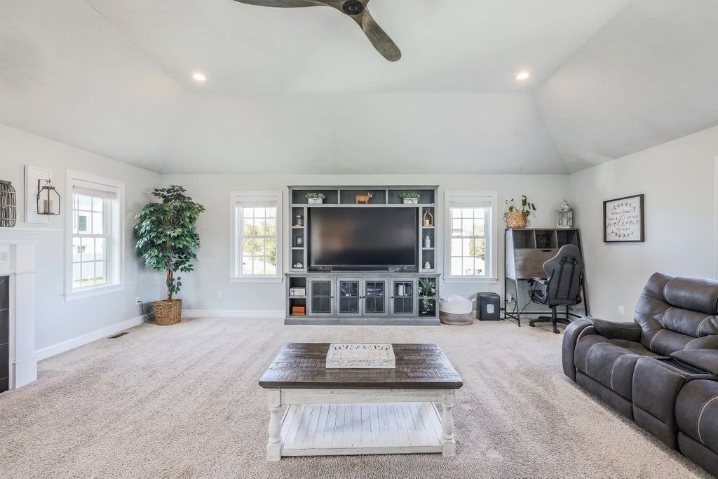 51 Woodside Avenue Rutland, MA 01543 - Photo 15 of 24 a living room with furniture and a flat screen tv