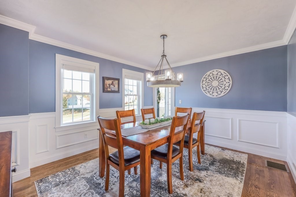 51 Woodside Avenue Rutland, MA 01543 - Photo 16 of 24 a view of a dining room with furniture window and wooden floor