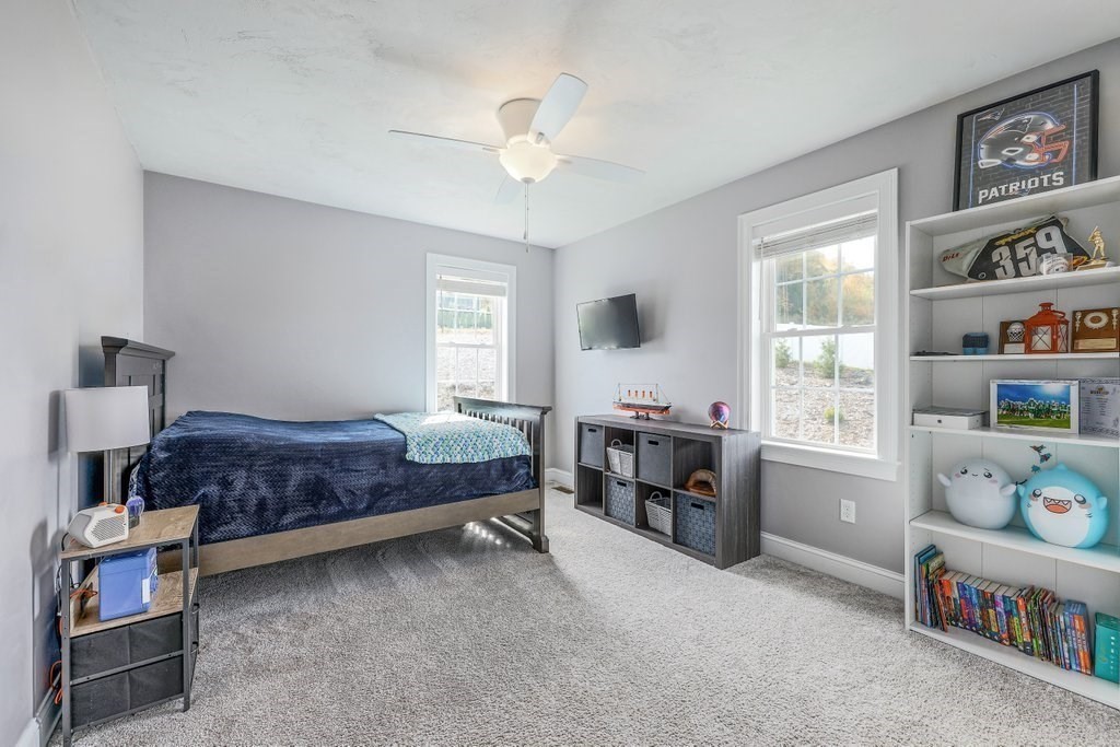 51 Woodside Avenue Rutland, MA 01543 - Photo 22 of 24 a bedroom with a bed and a window