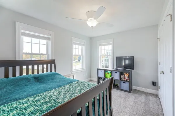 a view of livingroom with furniture and windows