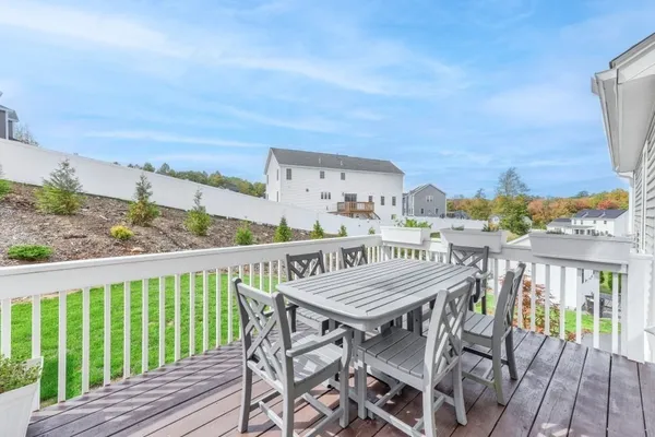 a view of a balcony with furniture