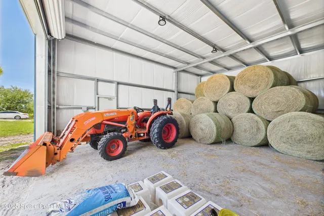 a bedroom with bed and balcony