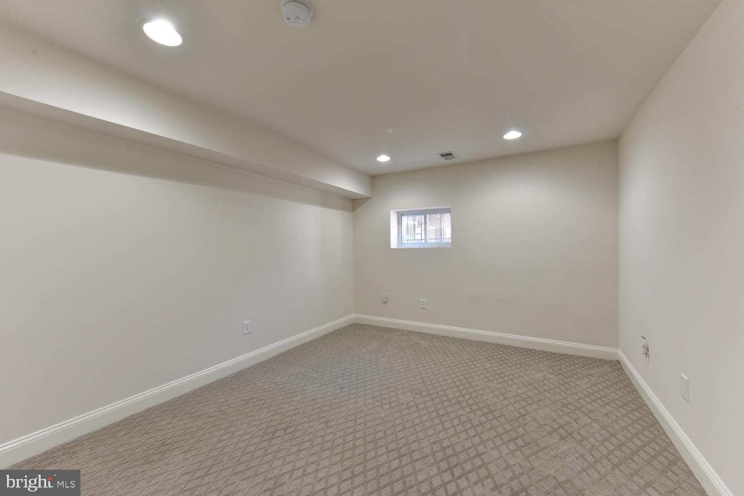 706 8th Street Northeast Washington, DC 20002 - Photo 36 of 47 Large Lower Unit Bedroom (11' x 13')