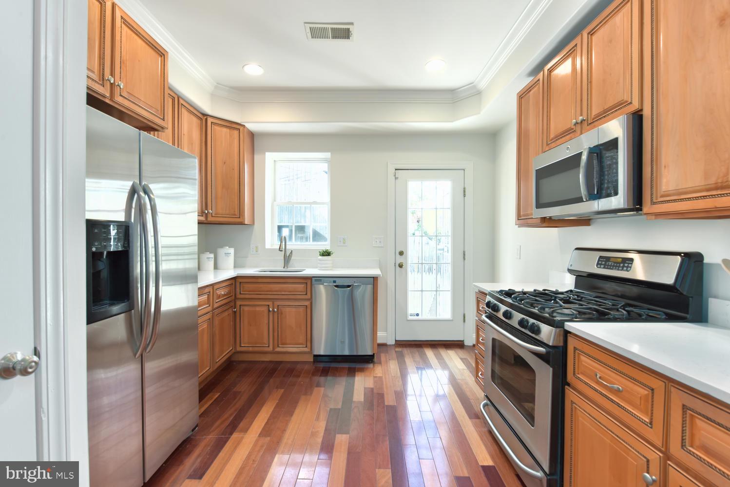 706 8th Street Northeast Washington, DC 20002 - Photo 9 of 47 Large, Bright Kitchen w Stainless Steel Appliances
