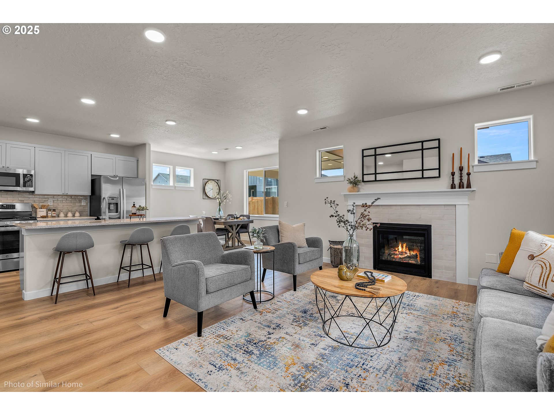 5103 Cedar View Drive Springfield, OR 97478 - Photo 2 of 7 a living room with furniture and a fireplace