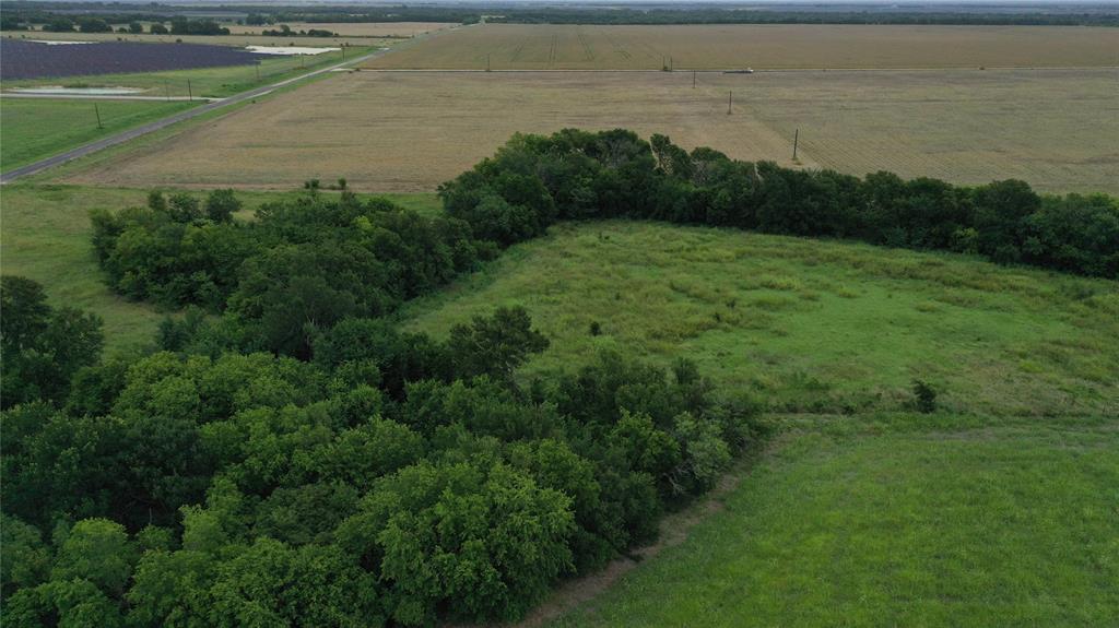 6 Cr 151 Riesel Tx 76682 Riesel, TX 76682 - Photo 3 of 10 a view of a lake with a yard