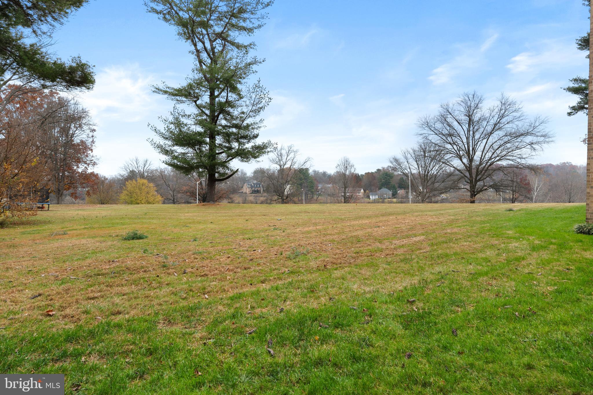 18715 Walkers Choice Road, Unit 18715 Montgomery Village, MD 20886 - Photo 13 of 30 a view of outdoor space with yard and lake view