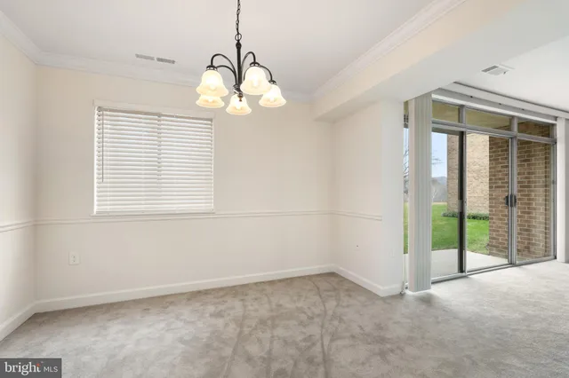 a view of a room with a large window