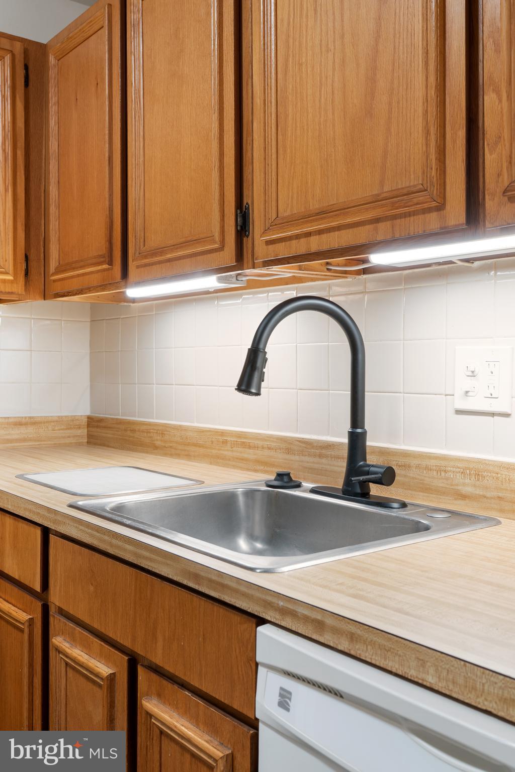 18715 Walkers Choice Road, Unit 18715 Montgomery Village, MD 20886 - Photo 10 of 30 a close view of sink and tap