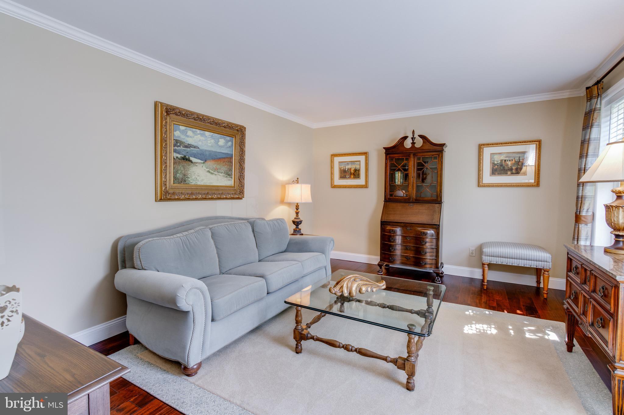 3888 Sterling Way Columbia, PA 17512 - Photo 15 of 44 a living room with furniture and a bookshelf
