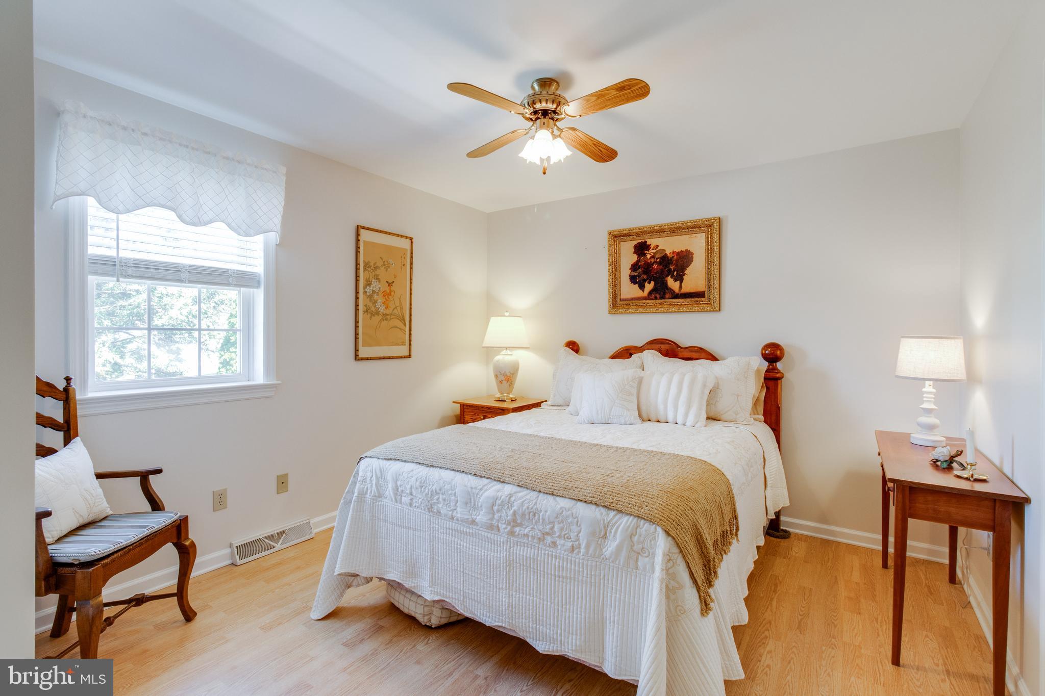 3888 Sterling Way Columbia, PA 17512 - Photo 27 of 44 a bedroom with a bed and a chair