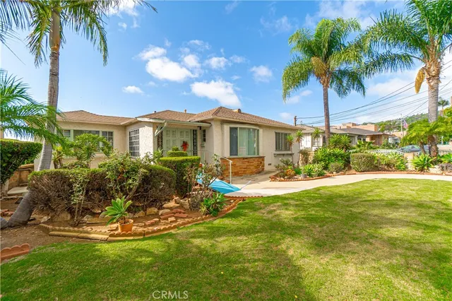 a view of a house with swimming pool and porch with furniture
