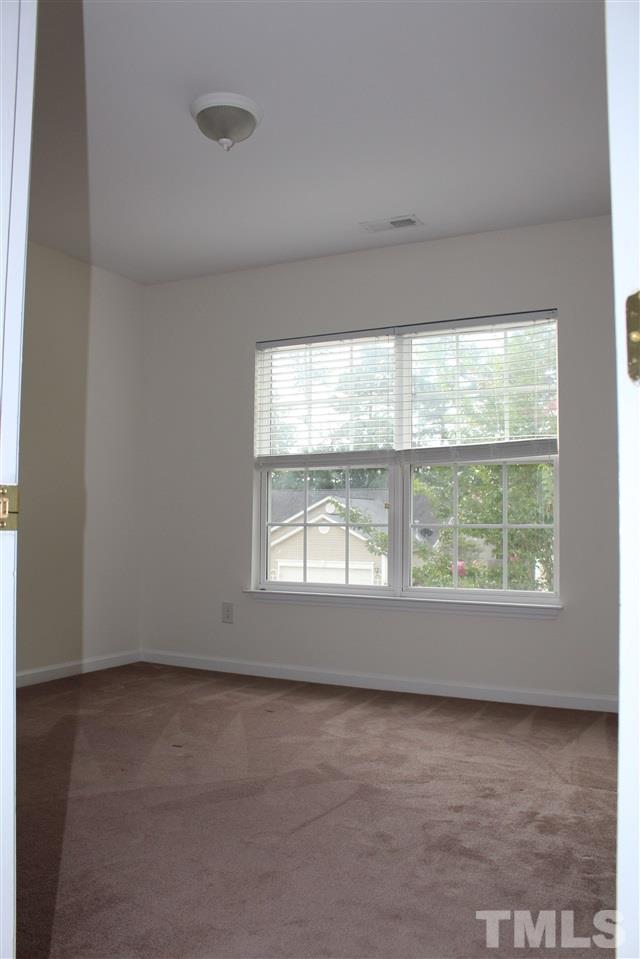 5321 Neuse Forest Road Raleigh, NC 27616 - Photo 14 of 25 an empty room with a window