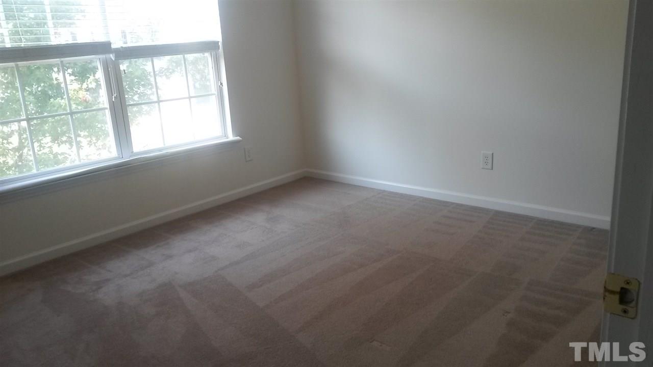 5321 Neuse Forest Road Raleigh, NC 27616 - Photo 15 of 25 an empty room with a window
