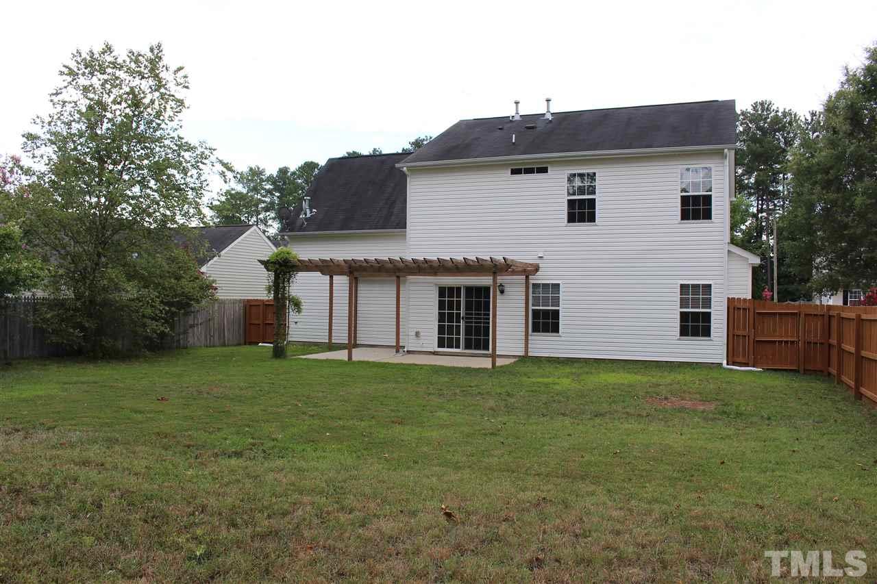 5321 Neuse Forest Road Raleigh, NC 27616 - Photo 3 of 25 a front view of a house with a garden
