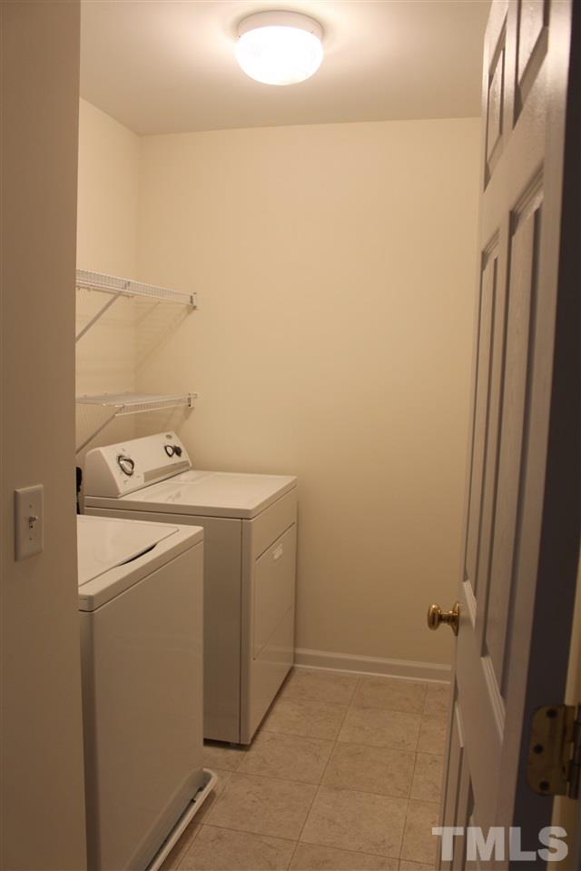5321 Neuse Forest Road Raleigh, NC 27616 - Photo 21 of 25 a utility room with dryer and washer