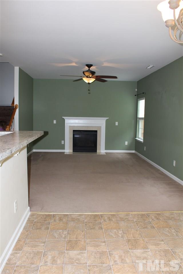 5321 Neuse Forest Road Raleigh, NC 27616 - Photo 24 of 25 a view of a livingroom with a kitchen
