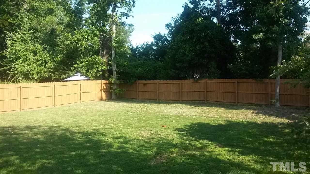 5321 Neuse Forest Road Raleigh, NC 27616 - Photo 4 of 25 a view of backyard and tree