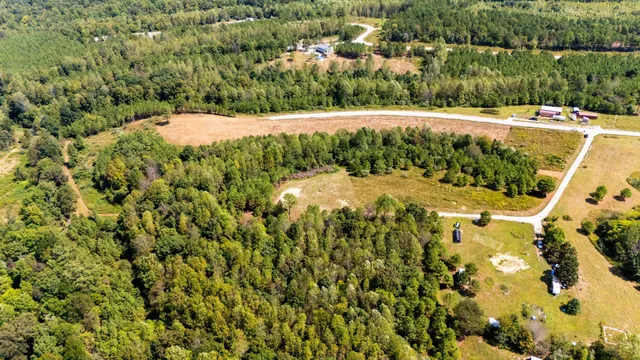 a view of a lake with a yard