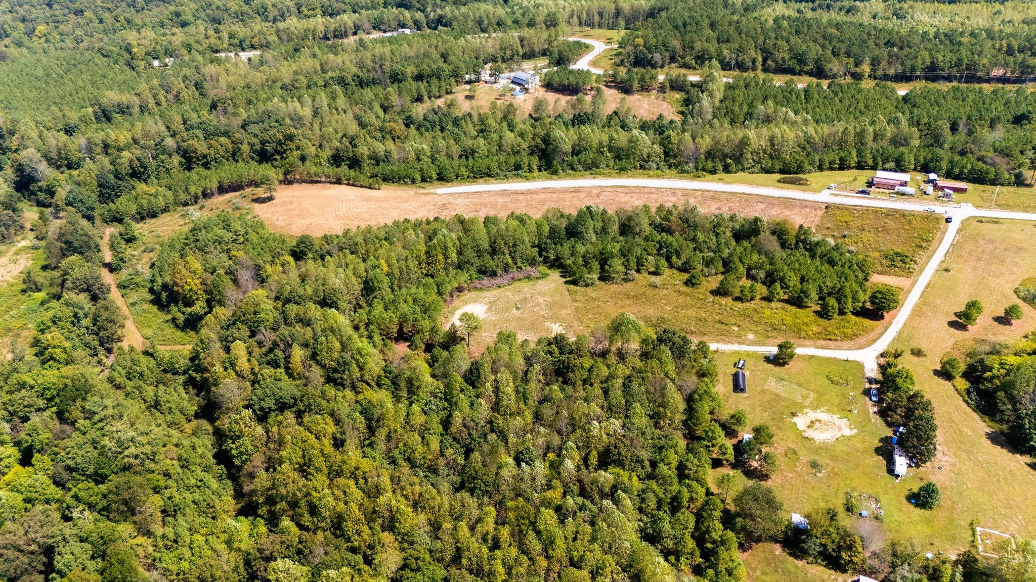 397 Lukas Road Lawrenceburg, TN 38464 - Photo 7 of 10 a view of a lake with a yard