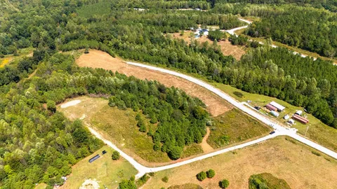 a view of swimming pool from a balcony
