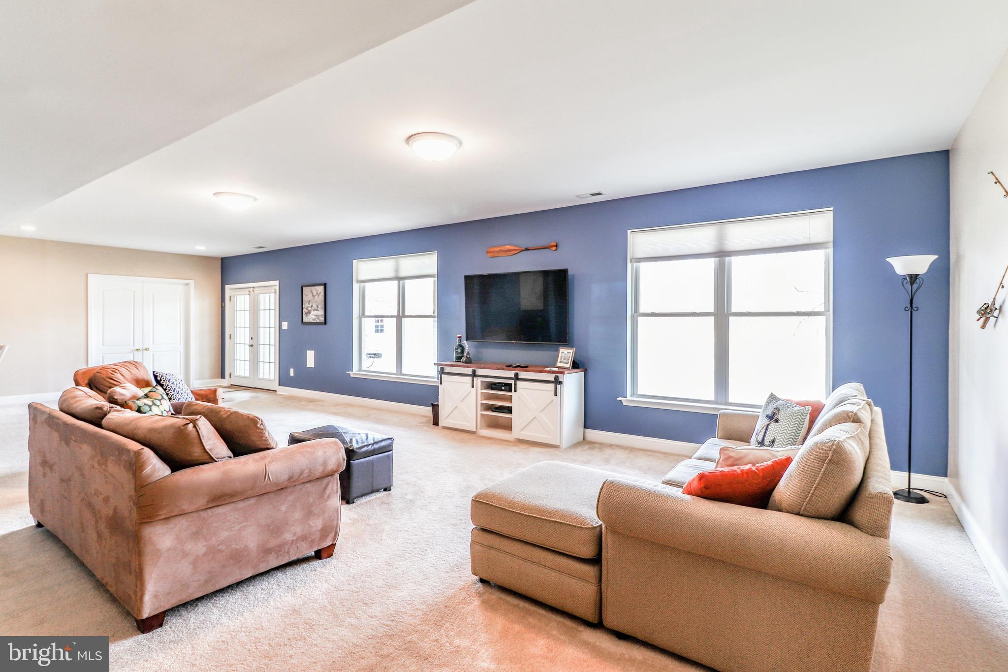 11151 Rawhide Road Lusby, MD 20657 - Photo 21 of 35 Lower level family room